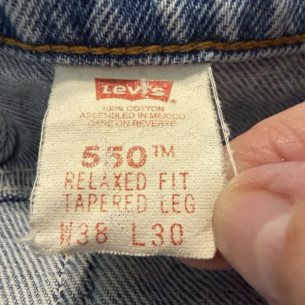 Vintage Levi’s 550 Jeans Men’s 38x30 Relaxed Fit Tapered Leg Light Wash orange